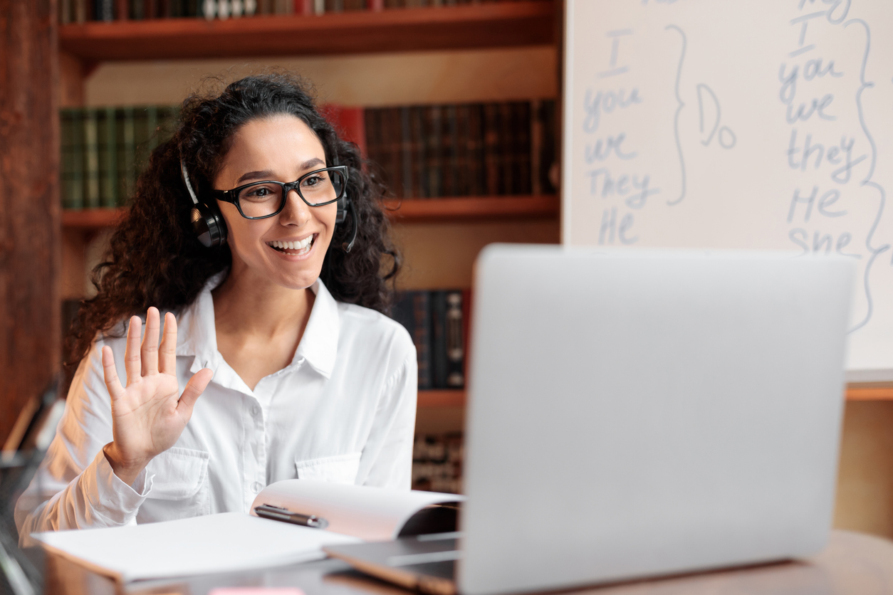 Online tutor on call with student